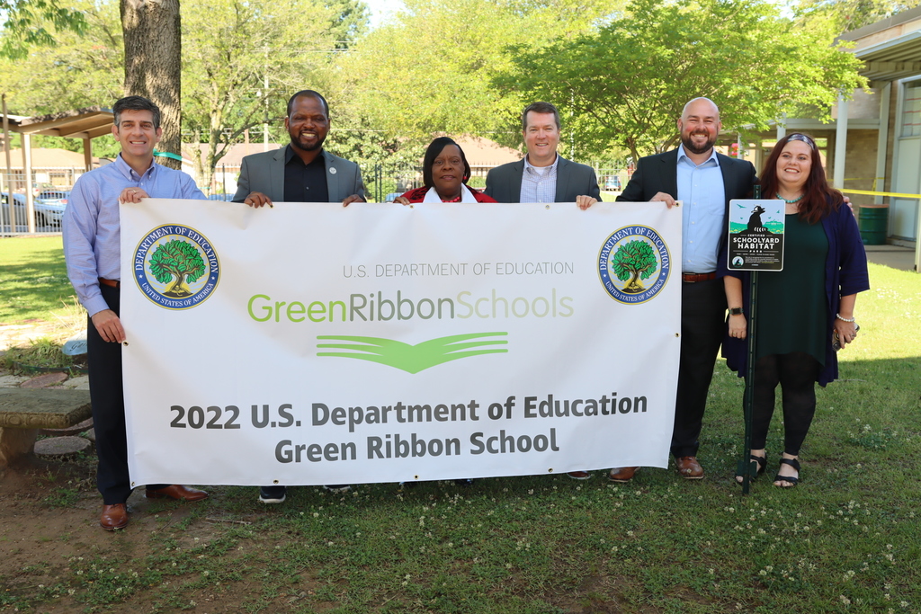 Green Ribbon school holds poster to show accomplishment